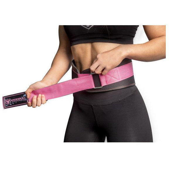 Iron Bull Women Weightlifting Belt in use — woman cinching the gray and pink lifting belt at the gym